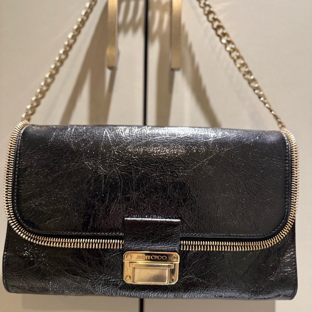 Jimmy Choo Black Leather Clutch with Gold Accents